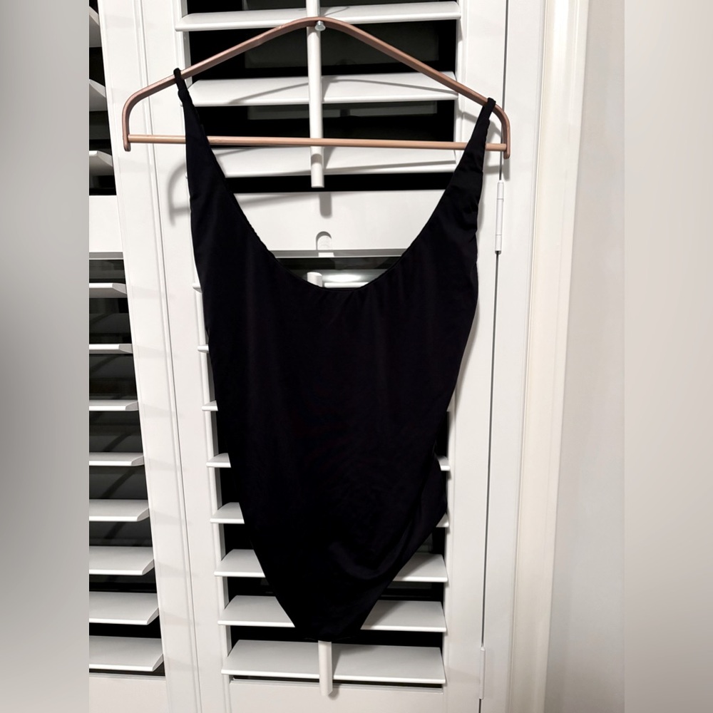 Lulus one piece black bathing suit, size medium.